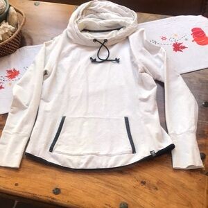 Performance sweatshirt in size medium. Soft off-white color.